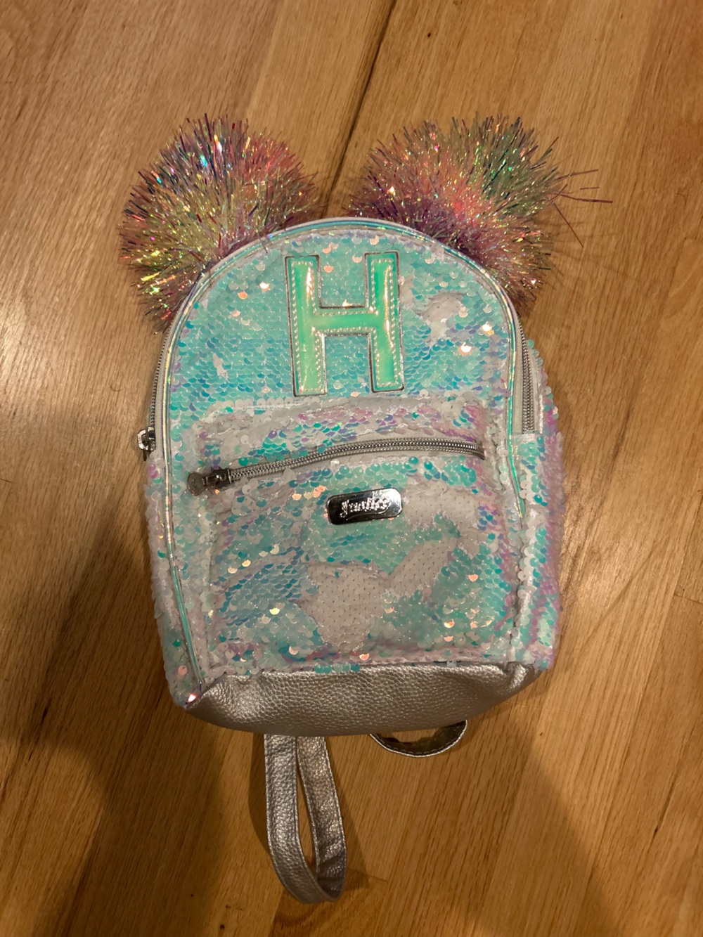 Justice Sequin Mini Backpack in Turquoise, Silver & Pink Pom Poms